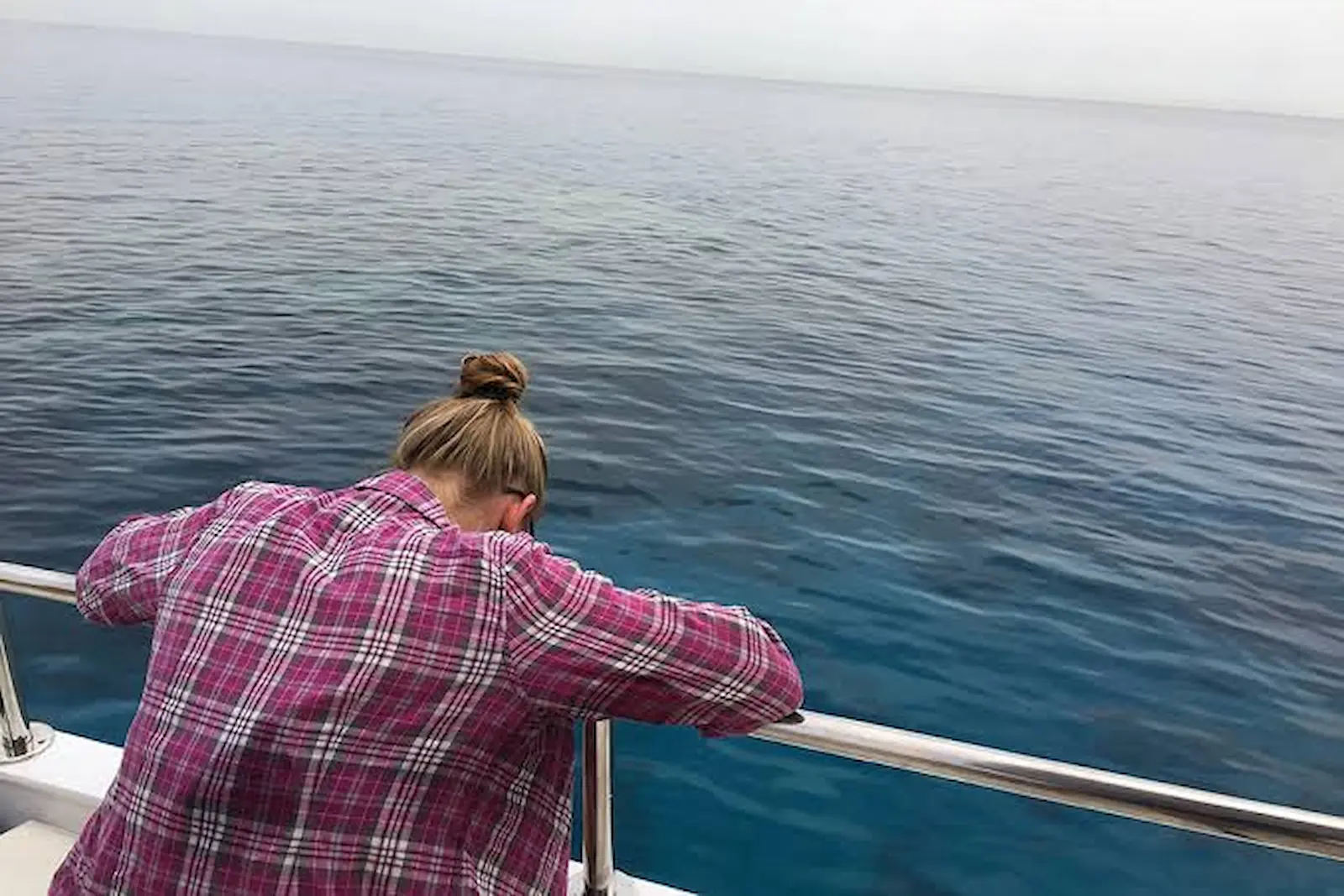 Angler enjoying a calm day on a fishing charter off Quepos, Costa Rica