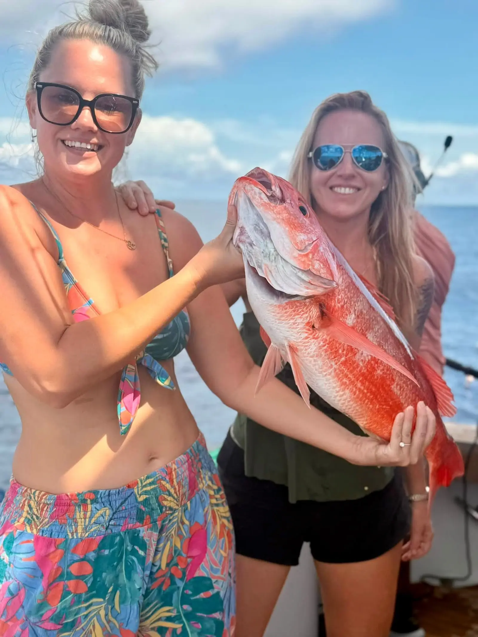 Angler fighting a fish on a private charter off Quepos, Costa Rica